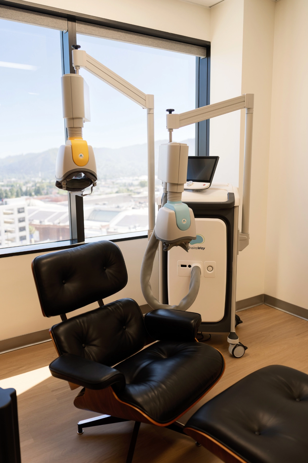 BrainsWay Deep TMS equipment in a private treatment room