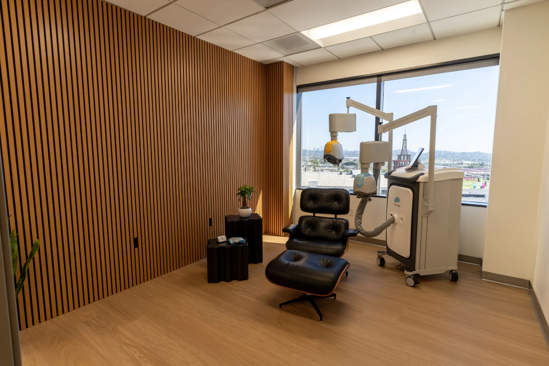 Breakthrough TMS treatment room with BrainsWay Deep TMS equipment